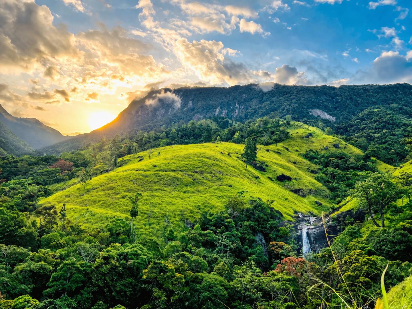 49-Where the hills glow in soft golden light and the waterfall quietly finds its way through the valley, moments like this near Eco Wild Glamping Bambarakanda reminds you how beaut.#ecowildglampingba Eco Wild Glamping Bambarakanda – Eco Tourism Hospitality Project